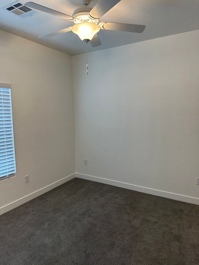 Building Photo - Experience Modern Elegance in this Summerlin Townhouse