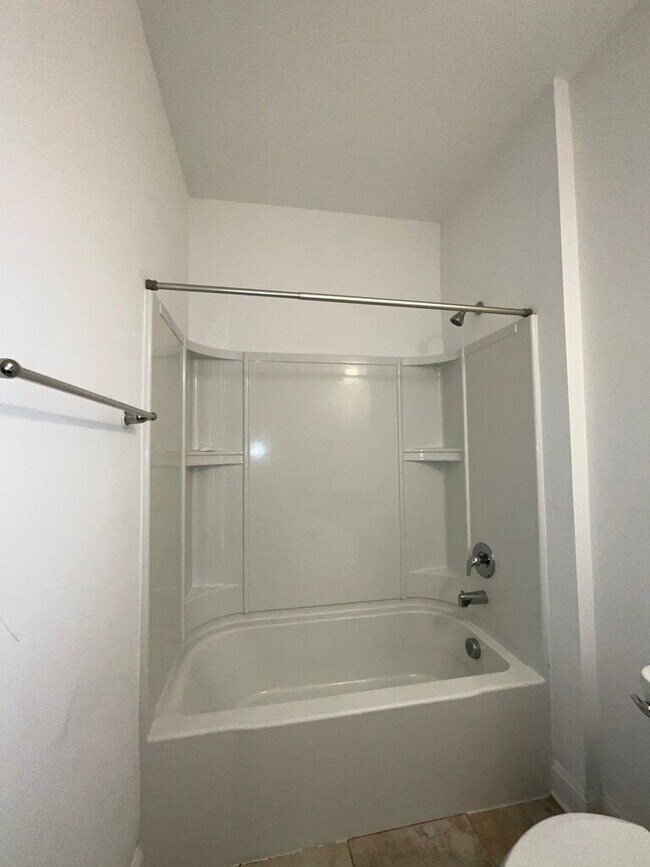 Building Photo - "Spacious 4-Bed Oasis with Stunning Lake V...