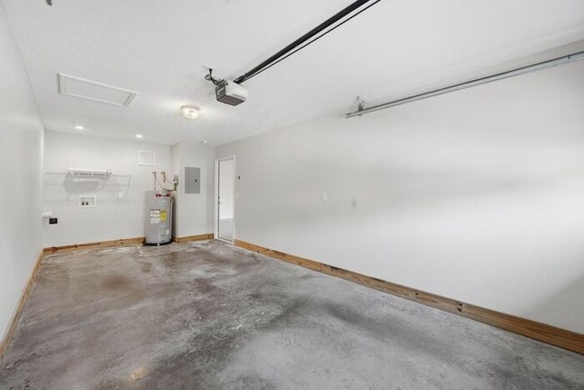 Building Photo - Single-Level Apartment Homes with Attached Private Garages – No Upstairs Neighbors