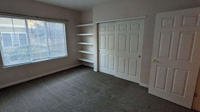 Building Photo - AWESOME 2-BEDROOM CONDO INCL. GARAGE, SWIM...