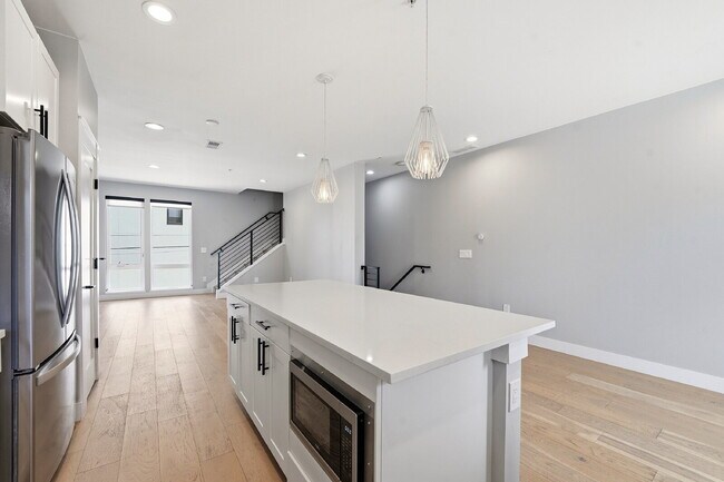 Building Photo - $3,565.95 with $300 off the first month's rent, 2 Beds - 3 Baths, Townhouse in Denver with Unmatc...