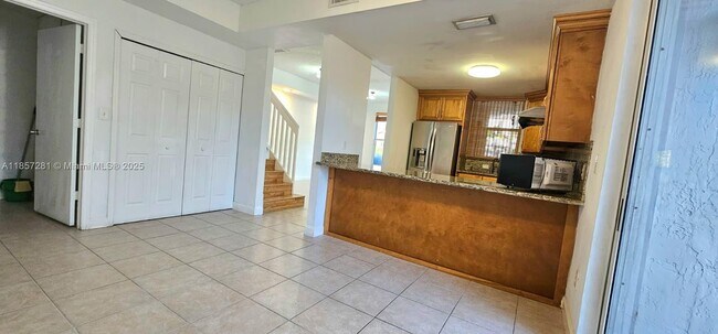 Building Photo - 8575 SW 152nd Ave