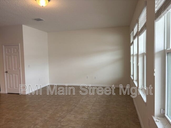 Building Photo - 8130 Red Stopper Ln