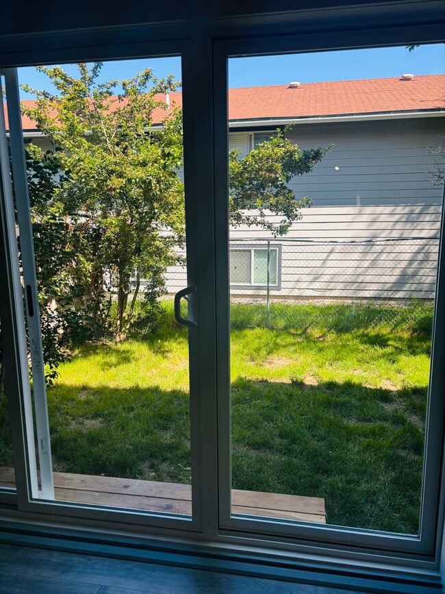 Building Photo - Renovated 3BR condo w/ garage & private yard **MOVE IN SPECIAL - $100 off each month**