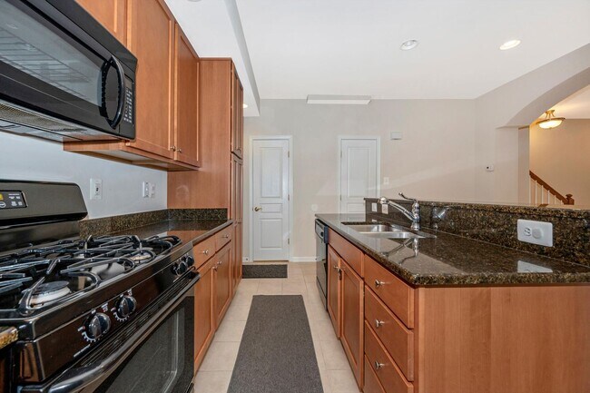 Building Photo - Desirable Two Level Condo For Lease - Not Pet Friendly