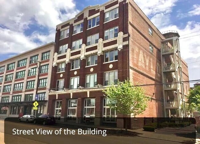 Primary Photo - Modern Condo on Front St. with River views...