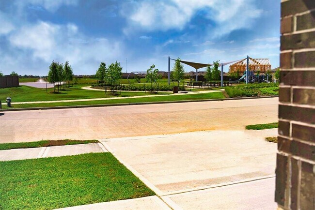 Building Photo - 27306 Sunterra Village Dr