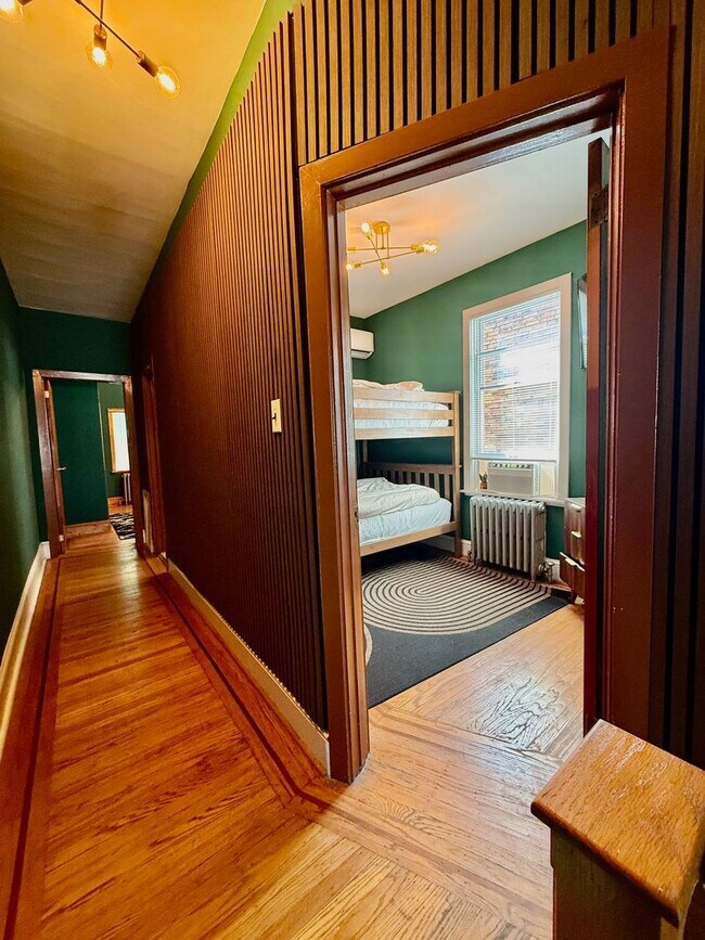 Building Photo - SPACIOUS & MODERN 3 BED/2.5 BA HOUSE w/ AC-Inlaid HARDWOOD Flooring-WASHER/DRYER & Rear PATIO in ...