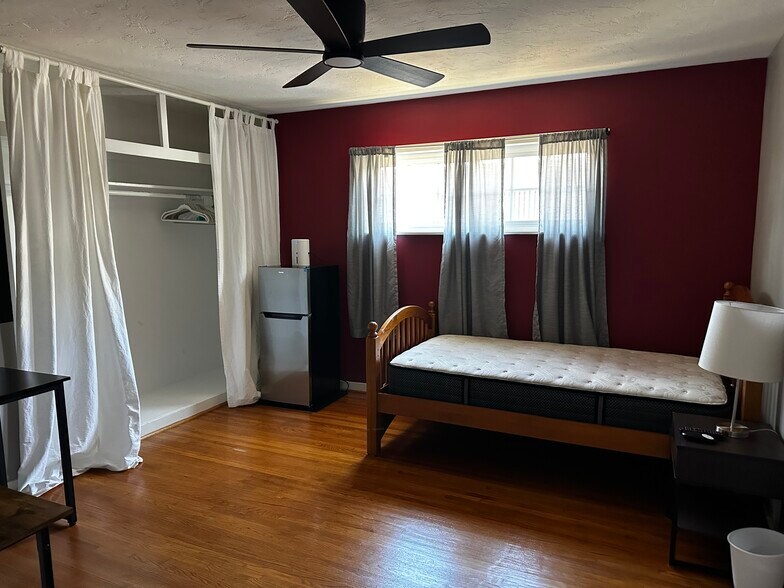 Bedroom includes personal fridge - 504 Douglas Ave