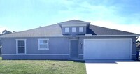 Building Photo - ***STUNNING 4/2 HOME IN PALM BAY**