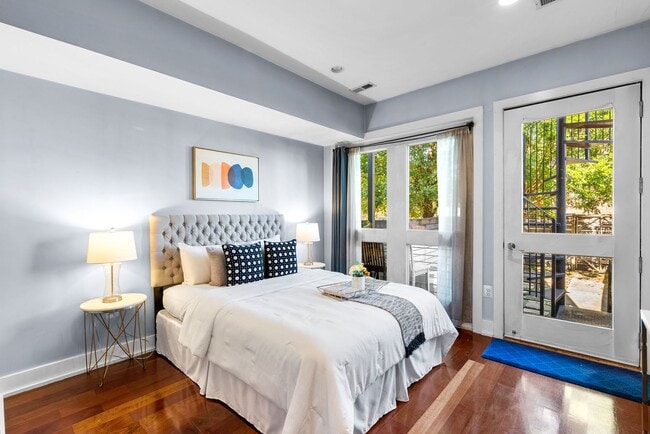 Building Photo - Stylish 2-Level Condo with Private Yard & Chef’s Kitchen Near Petworth Metro!