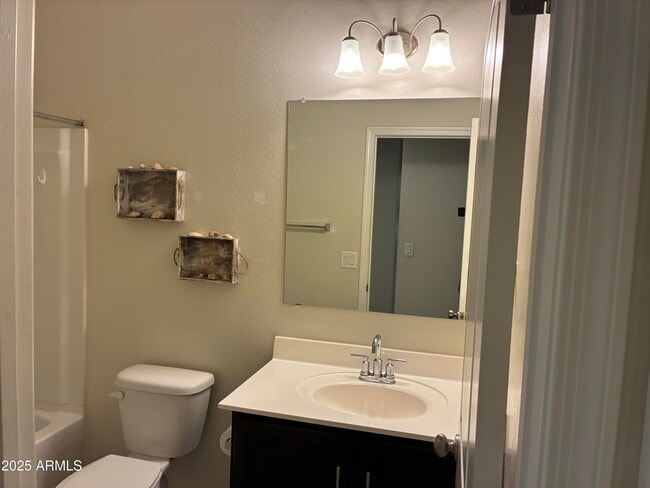 Building Photo - 25698 W Desert Dr