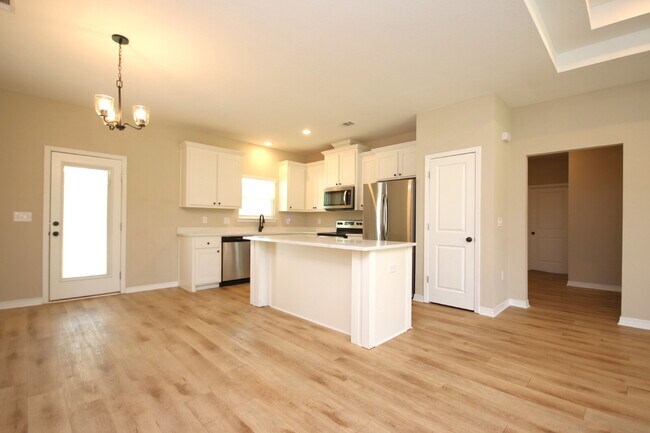Building Photo - Enjoy Country Living with Modern Comforts!  3BR/2BA Home  with Granite Countertops, Covered Porch...
