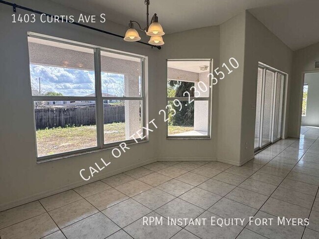 Building Photo - 1403 Curtis Ave S