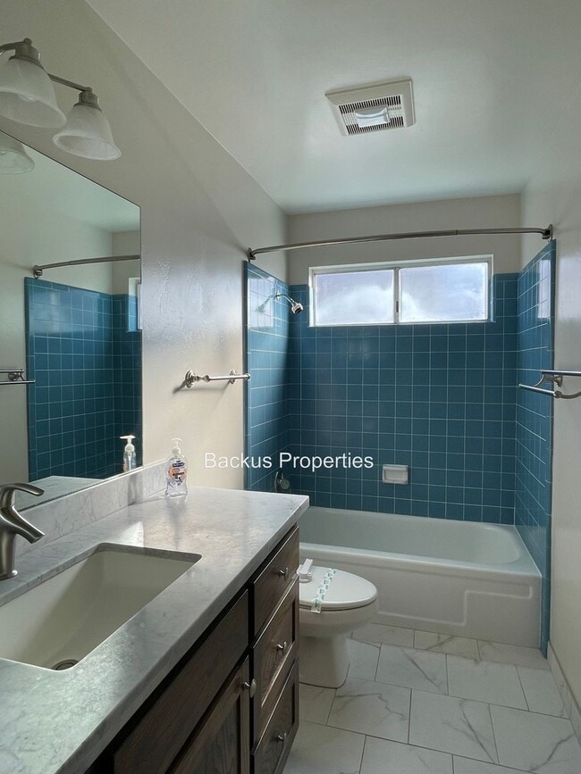 Building Photo - Recently remodeled three bedroom home in T...