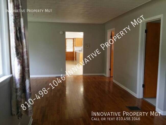 Building Photo - Spacious 4 bedroom , 1 1/2 bath home in Ga...