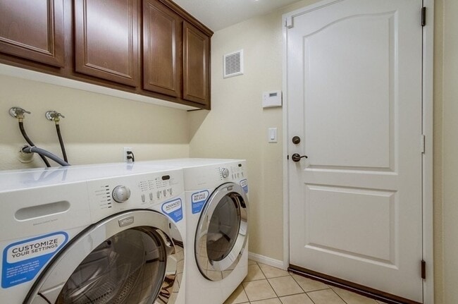 Building Photo - **Move in Special $1000 off 1st month's rent**Stunning 3-bed, 3.5 bath, tri-level condo w 2-car g...