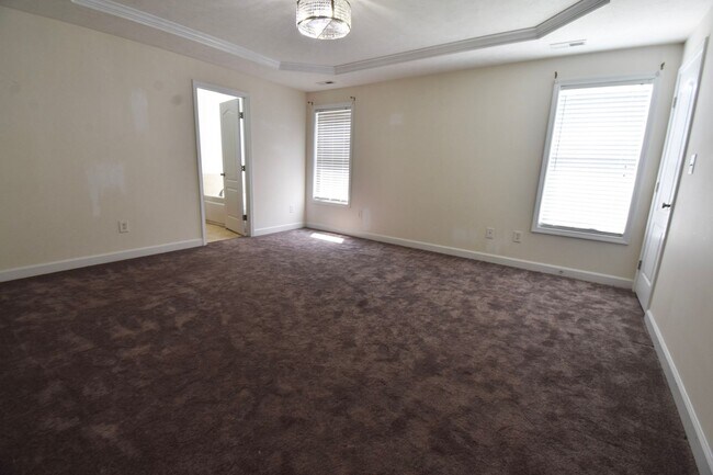 Building Photo - Coming Soon!! 4 Bedroom 2.5 Bath Nicely Renovated with Updated Fixtures! - No Pets