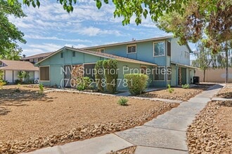 Building Photo - SE!! Close to UNLV!! 2 Bedroom 2 story!! 1 Car Carport!! Fully Furnished!! Community Pool!! and T...