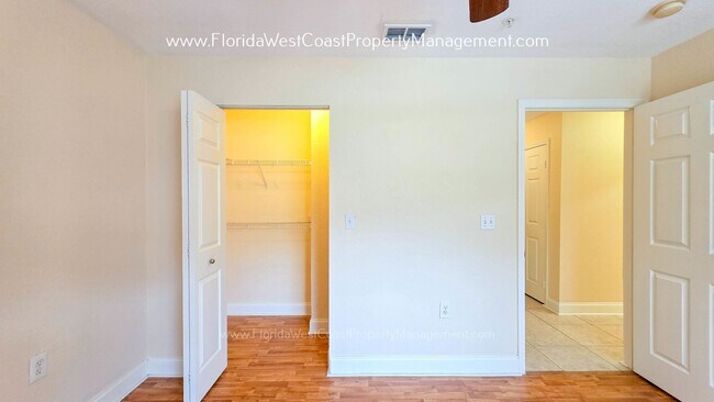 Building Photo - MOVE IN READY! LARGE 2 BEDROOM/2 BATH PLUS ATTACHED GARAGE! TILE/LVP THROUGHOUT!