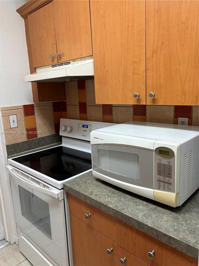 Building Photo - 10900 SW 104th St