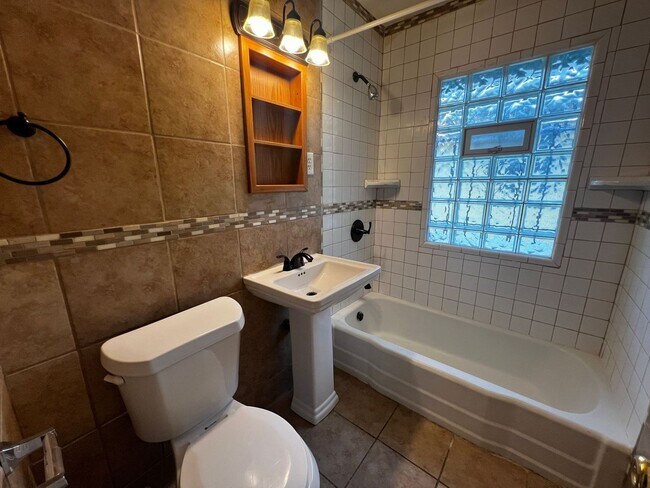 Building Photo - Freshly Painted 2-Bedroom with Refinished Hardwood Floors