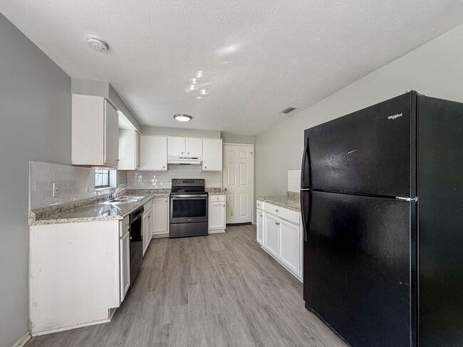 Building Photo - 7740 Arble Dr