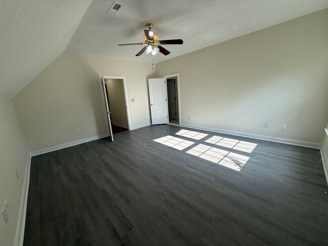Building Photo - Spacious 5-Bedroom Home on a Corner Lot in...