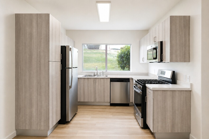 Renovated: Italian cabinetry, new stainless steel appliances. 5601 Taylor Ranch Rd NW, Albuquerque - Taylor Ranch