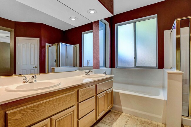 Building Photo - Gorgeous NW Single Story! 3 Car Garage! Serene Backyard.