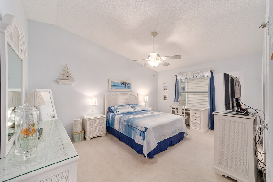 Bedroom is furnished with linens, queen bed - 790 Blake Ln