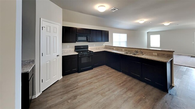 Building Photo - 9905 Rattlesnake Ln