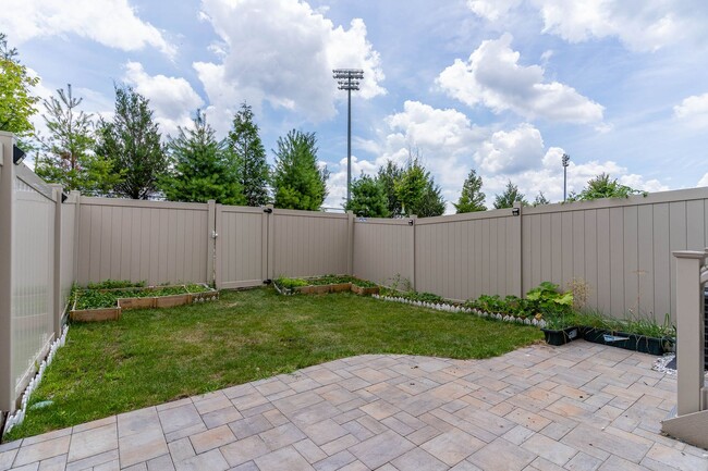 Building Photo - Townhouse with 1-Car Garage, Rooftop Deck ...