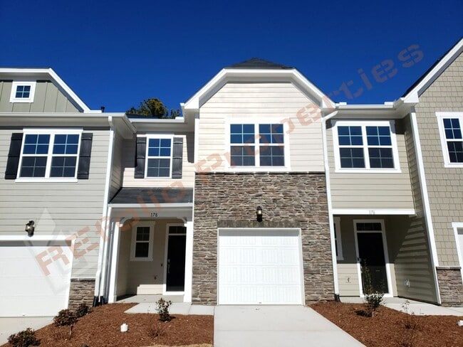 Primary Photo - Brand New 3 BR 1-Car Garage Townhome in Do...