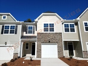 Building Photo - Brand New 3 BR 1-Car Garage Townhome in Do...