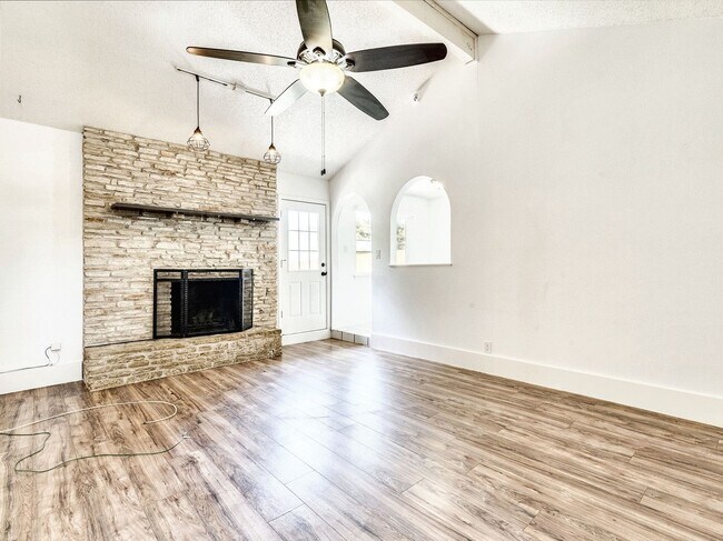 Building Photo - Charming 4BR / 2BA Home Featuring Fireplace, White Cabinets & Big Tree