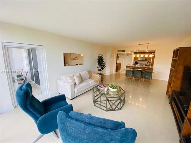 Building Photo - 10275 Collins Ave