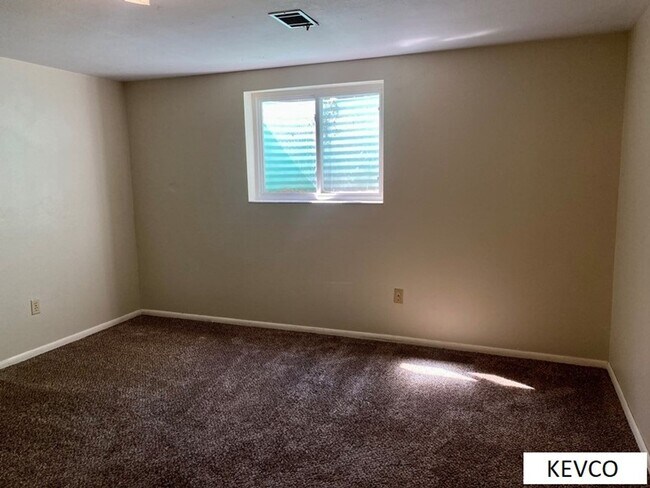 Building Photo - Four Bedroom Single Family Home with Large Backyard