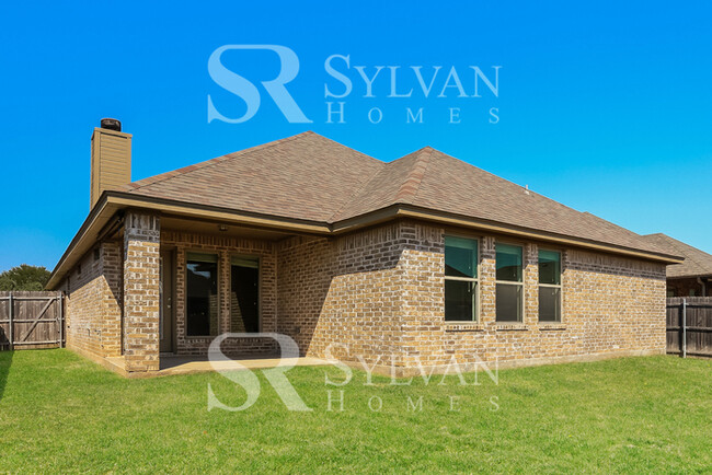 Building Photo - This lovely brick home is waiting for you!