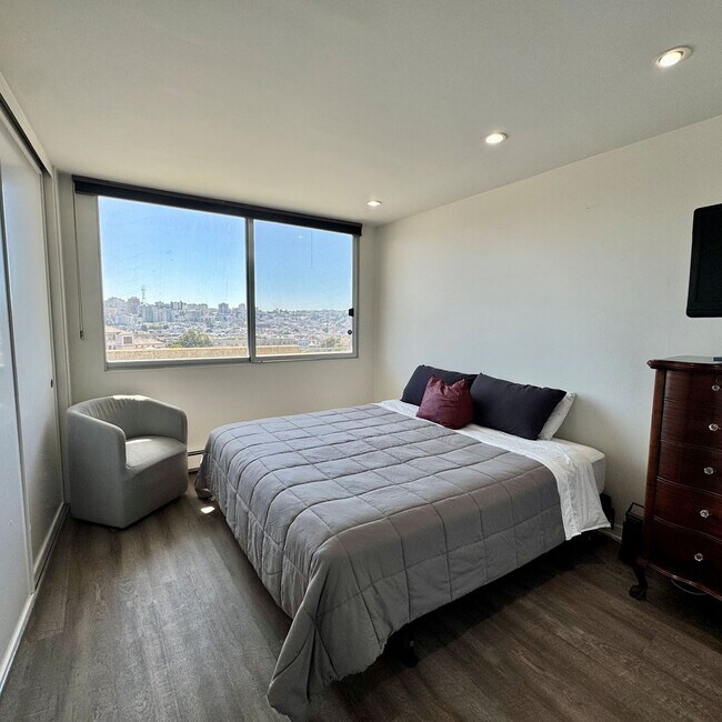 Building Photo - Just Unpack, Pour a Beverage, & Cue the Su...