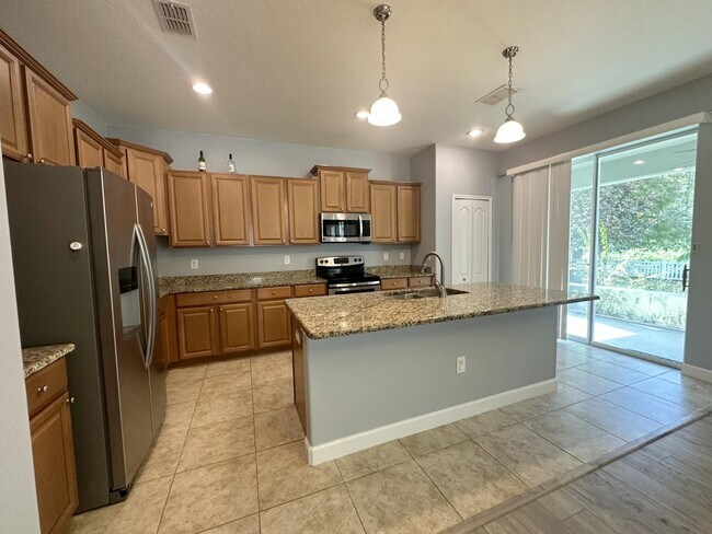 Building Photo - "Spacious 5-Bedroom Retreat with Scenic Views in The Verandahs!"