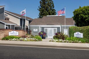 Building Photo - Carmenita Townhouse Apartments