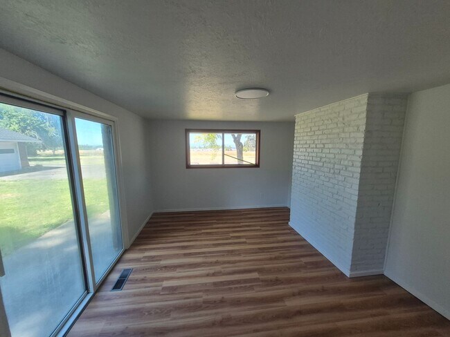 Building Photo - Refurbished home with Basement and large yard