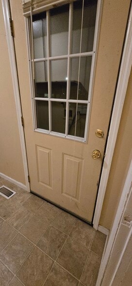 carport entrance to laundry rm - 103 N Roosevelt St