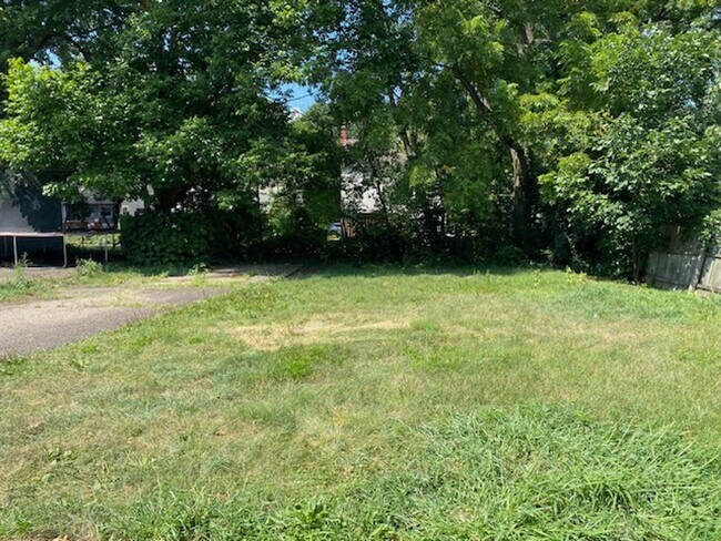 Building Photo - Warm & Bright West Akron 3BR with Fireplace, Off-Street Parking & Backyard