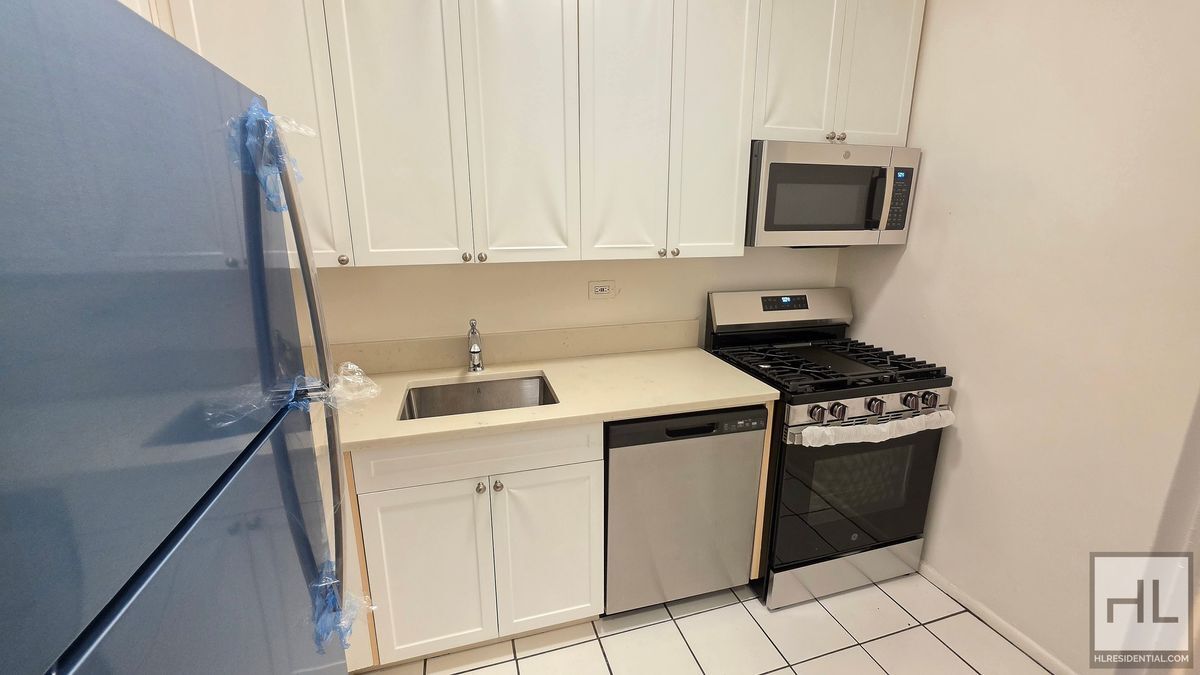 Building Photo - Midtown East 2-Bed, 2-Bath with Private Patio