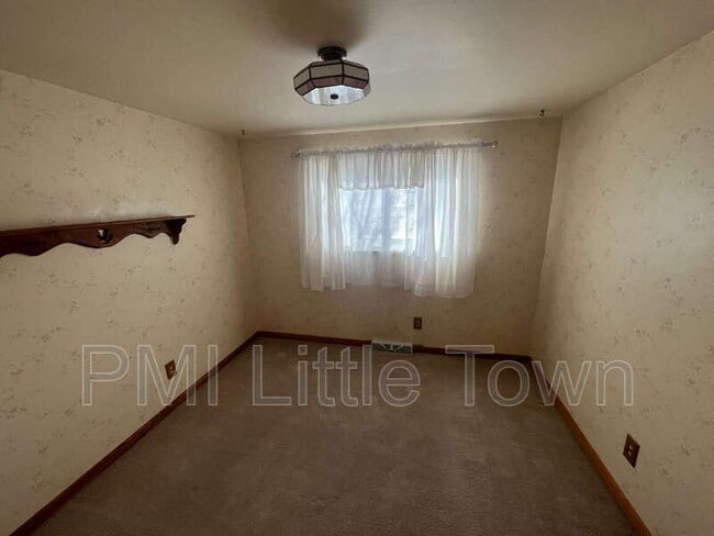 Building Photo - 5001 W Tufts Ave
