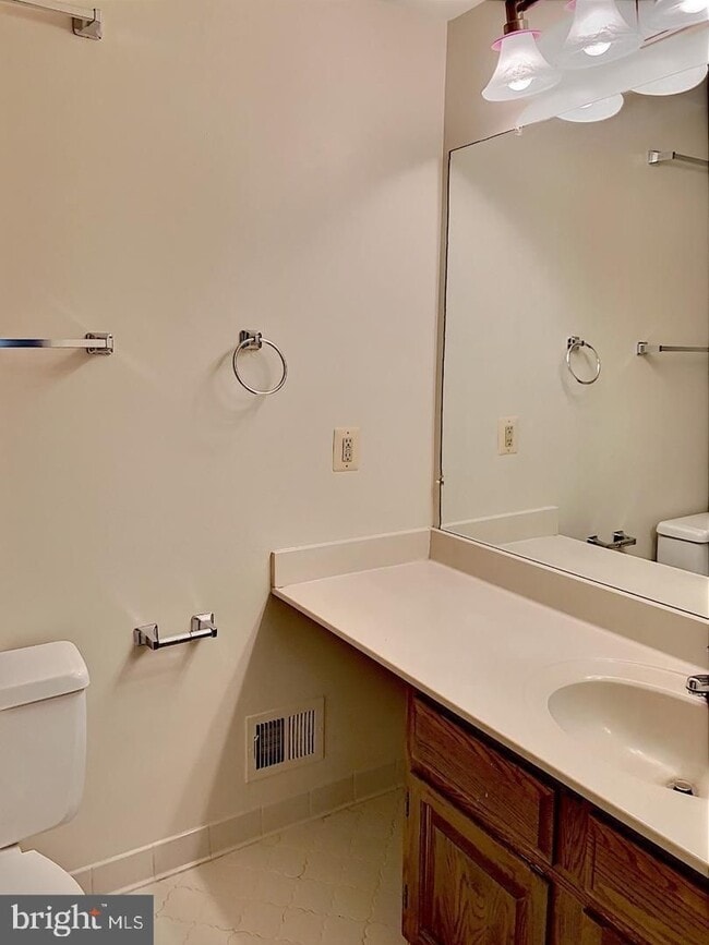 Building Photo - Welcome to this beautifully maintained brick end residence in the heart of Falls Church, where co...