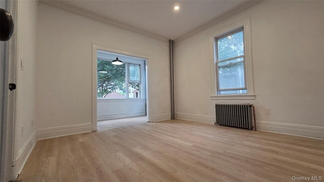 Building Photo - 42-21 65th Pl