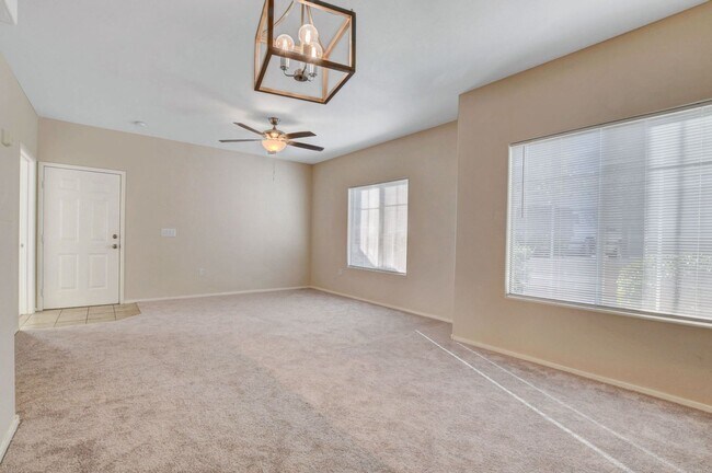 Building Photo - FIRST FLOOR CONDO IN GATED COMMUNITY W/ SINGLE CAR GARAGE